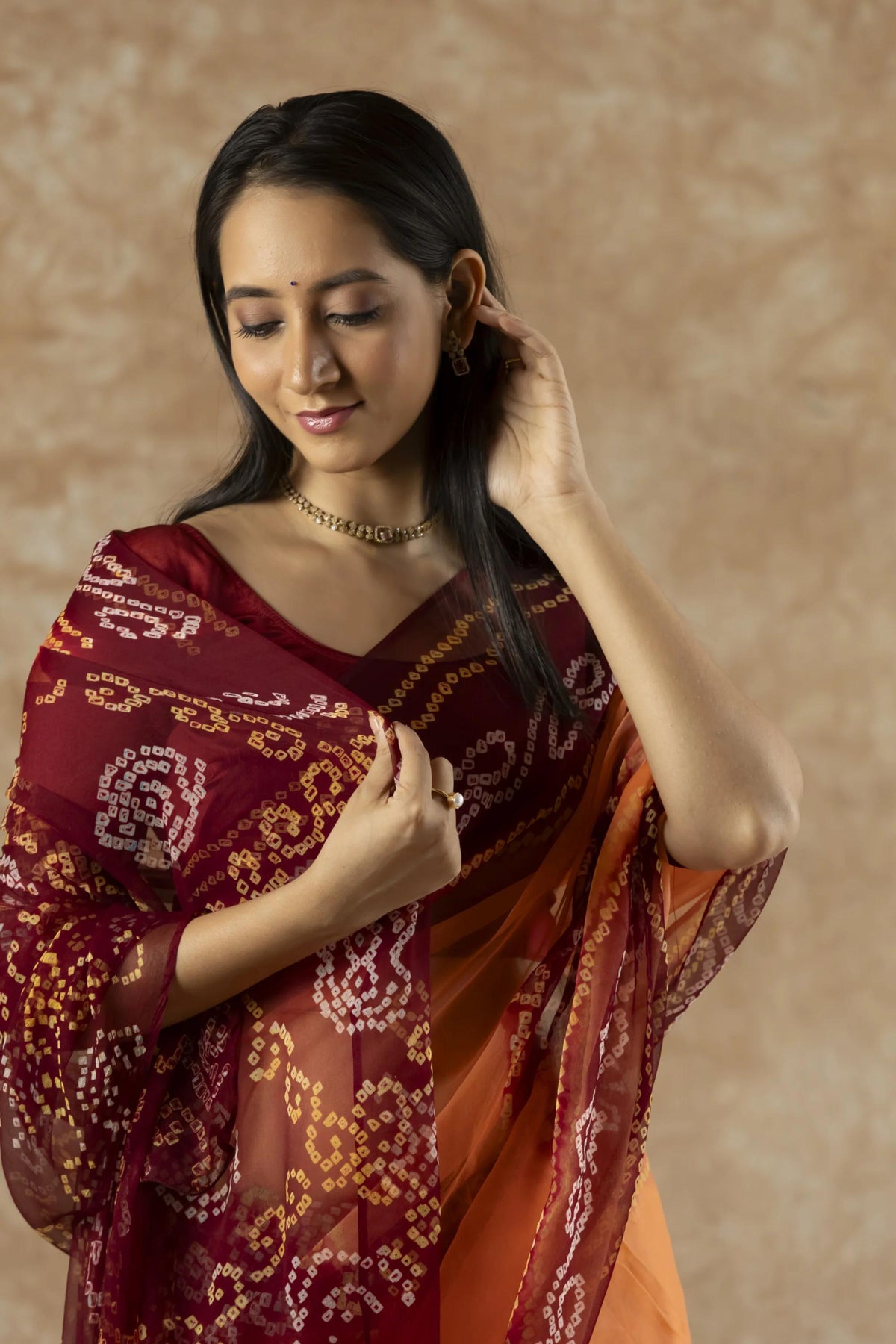 SAHELI STYLEPRESENTS GEORGETTE BANDHANI SAREE MAROON+ORANGE