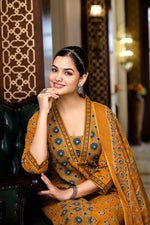 SAHELI STYLE PRSENTS LIGHT ORANGE KURTI PANT DUPATTA PAIR