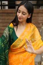 SAHELI STYLEPRESENTS GEORGEETEBANDHANI ORANGE SAREE