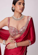 SAHELI STYLE PRSENTS Rangoli Silk saree features intricate real mirror work embroidery along the border Saree