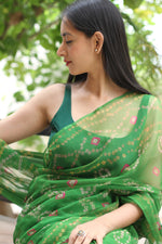 SAHELI STYLEPRESEETS GEORGETTE BANDHANI GREEN SAREE
