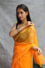SAHELI STYLEPRESENTS GEORGEETEBANDHANI ORANGE SAREE