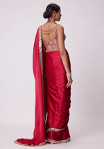 SAHELI STYLE PRSENTS Rangoli Silk saree features intricate real mirror work embroidery along the border Saree